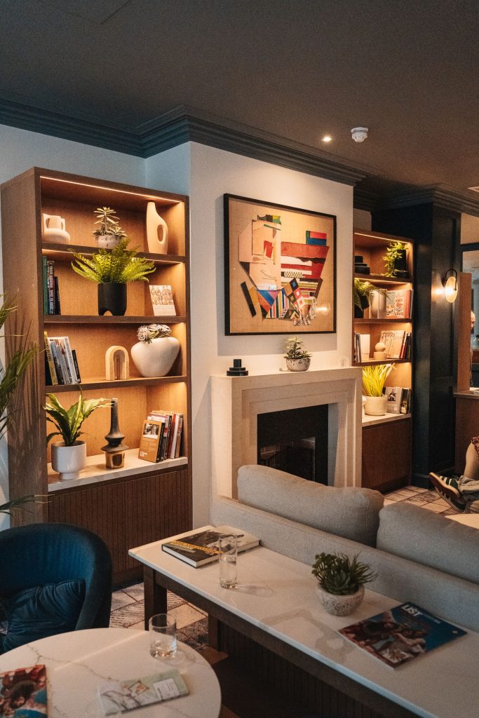 Modern cozy living room with a fireplace and decor