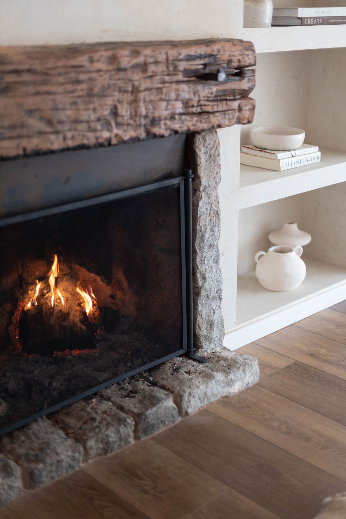 After: clean stone fireplace in a living room